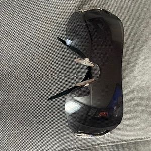 Roberto Cavalli sunglasses. Black lenses with silver snake siding.